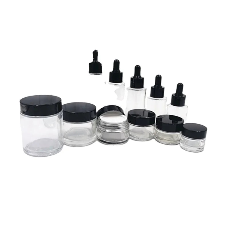 Luxury Cosmetic Glass Bottles 30ml 60ml 100ml Flat Shoulder Toner Pump Serum Packaging Label Dropper Oil Bottle Set