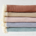 Wholesale Solid Color Crinkle Cotton Muslin Infant Newborn Fringe Swaddle Bath Towel Baby Wrap Blanket with Tassel Trim
