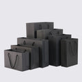 Wholesale Price Custom Logo Matte Black Gift Shopping Paper Bag for Clothing Packaging