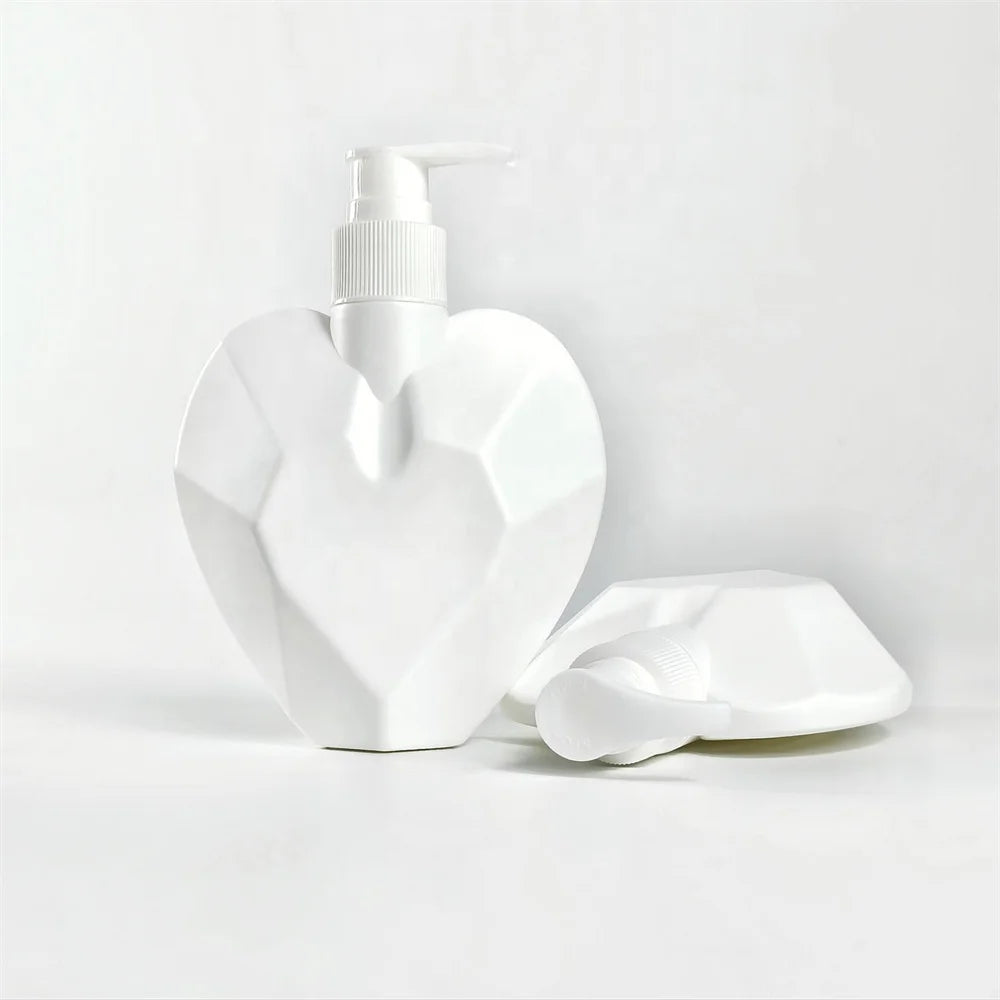 High-End 180ml Heart-Shaped Pump Seal Skin Care Bottle with Hot Stamping Surface for Serum Lotion Facial Cleanser & Shampoo