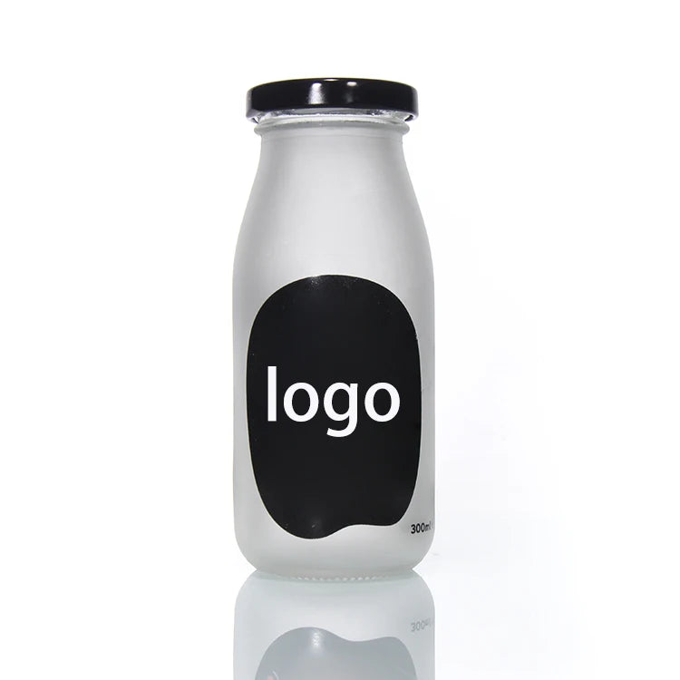 Wholesale 250ml 500ml Custom Logo Clear Round Shaped Cylinder Shape Glass Bottle With Metal Lid