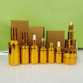 Cosmetic Packaging Luxury Serum Dropper Bottle 15ml 30ml 50ml 100ml Gold Color 1 oz Electroplating Essential Oil Glass Bottle
