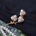 Plum Blossom Freshwater Pearl Brooch with Zircon Inlay 18K Gold Plated Luxury Jewelry for Women