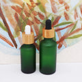 1oz Green Frosted Glass  Cosmetic Empty Bottles with Bamboo Lid