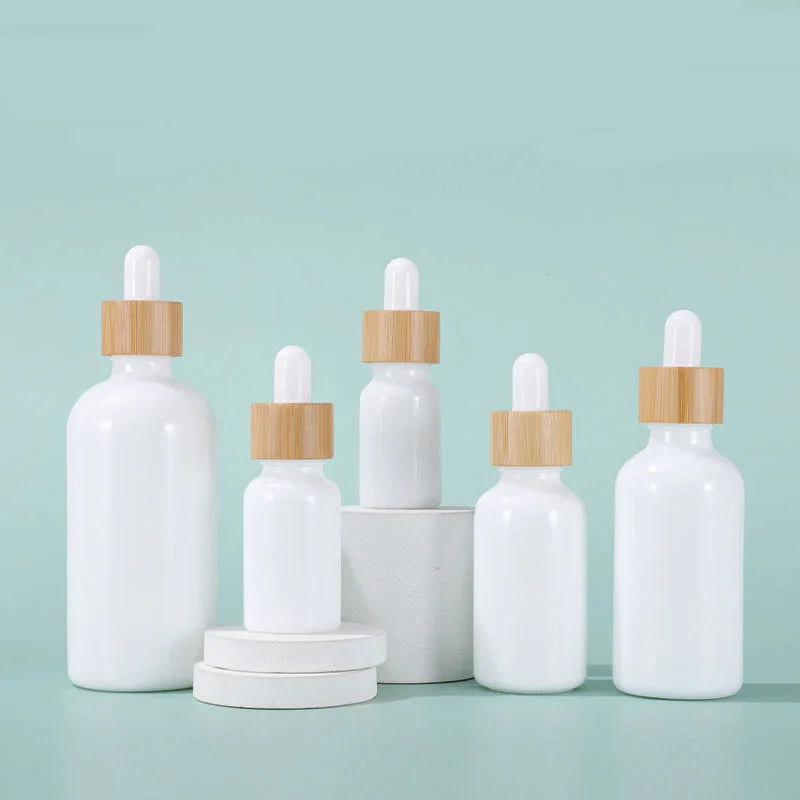 Hot Selling 15ml 30ml 50ml 100ml Empty Essential Oil Glass Dropper Bottle With Bamboo Lids