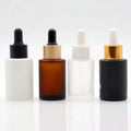 Wholesale Luxury Serum Bottle 30ml Flat Shoulder Cosmetic Serum Bottle Frosted Amber clear White Glass Serum Dropper Bottle