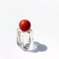 New Arrival 50ml Rounded Square Crystal Glass Perfume Bottle With Red Marble Resin Ball Cap