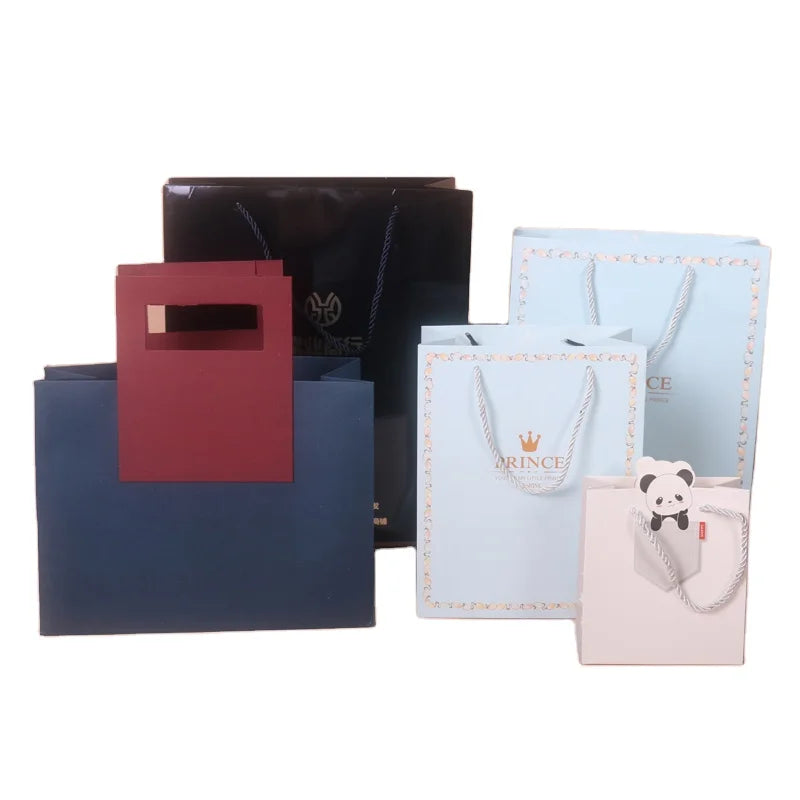 Custom Logo Printed Luxury Merchandise Retail Tote Art Paper Shopping Cardboard Packaging Bags for Clothes/clothing