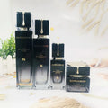 Custom Unique Black Cosmetic Packaging Set Empty Face Cream Jar Skincare Glass Lotion Bottle with Pump