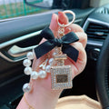 Diamond BowKnot Pearl Beads Keychain Metal Perfume Bottle Bag Charm for Women's Handbag Purse Car Key Ring Girls' Keychain