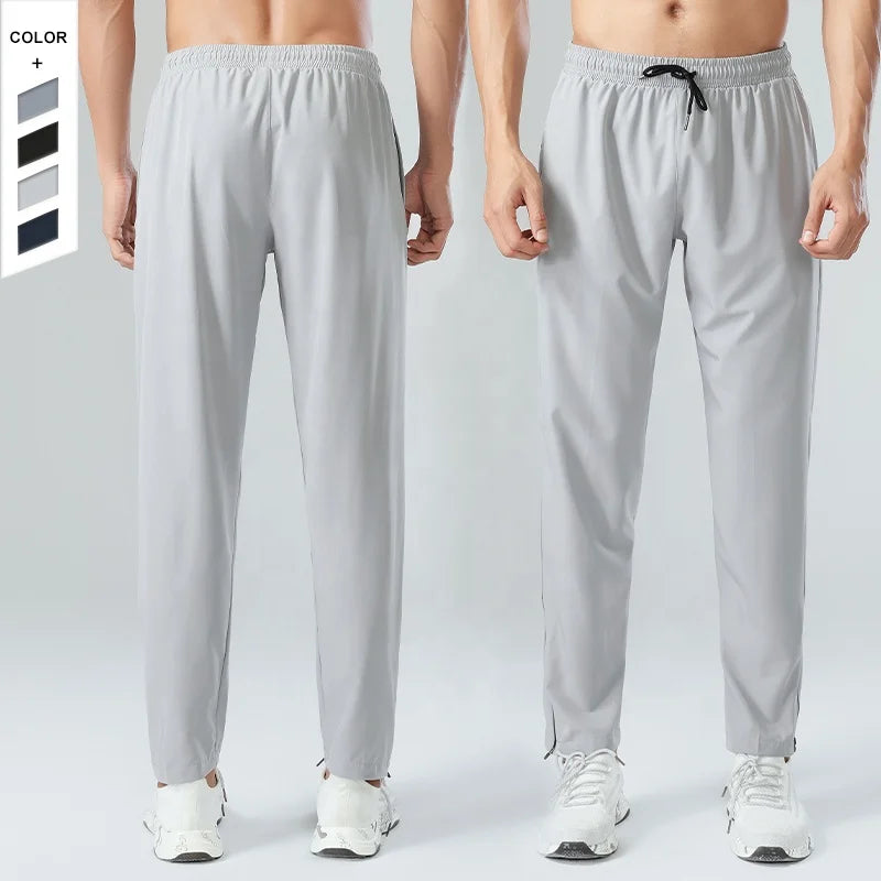 In Stock Softness Quick Drying Sports Casual Pants With Elastic Zipper Pockets Men's Fitness Pants