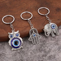 Promotional Price Hot Sale Alloy Blue Eye Owl Elephant Palm Devil Eye Retro Accessories Pendant Keychain Bag Pendant Gift