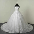 Actual Lace Beaded Sheer Neck Bridal Dresses Long Tail Cap Sleeve Puffy Floor Length 2026 White Wedding Gowns MW503