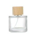 Fancy Cute Perfume Bottles 50ml Luxury Wholesale Cylinder Round Glass Perfume Bottles With Wood Cap