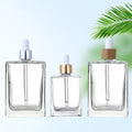 In Stock 15ml 30ml 50ml 100ml Rectangular Clear Cosmetic Glass Bottles with Droppers for Essential Oils Serums MOQ 100pcs