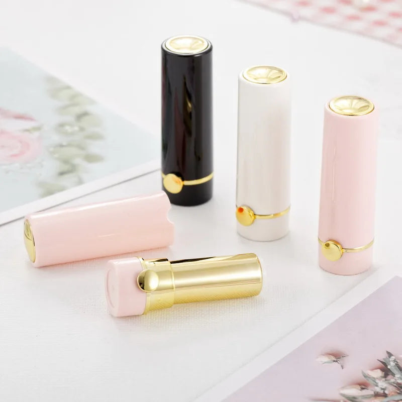 Yueshunxing Spot Wholesale 12.1mm Cosmetics Packaging Material Button Pink Lipstick Tube Multi-color Lip Balm Tube Empty Lipstick Tube