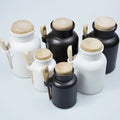 Wholesale Skin Care Jar 100ml 200ml 300ml Matte Bath Salt Jar Packaging Plastic Black Containers for Bath Salts with Cork