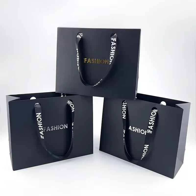China Factory Price Gift Wrapping Paper Bag with Own logo Printing Gold Shopping Paper Bag Black Paper Bag with Handle
