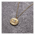 Chris April Low MOQ 316L Stainless Steel PVD Gold Plating Bumpy Texture Zircon Eye Coin Pendent Necklace