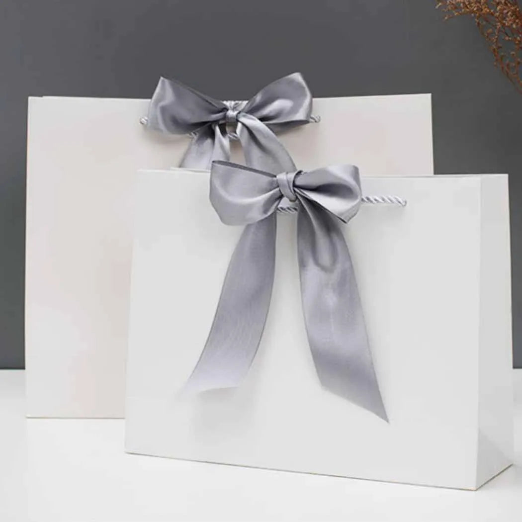 Custom Eco-Luxury Kraft Paper Shopping Bags With Printed Brand Logo Supplier Designs Ribbon Bow Fancy Packaging