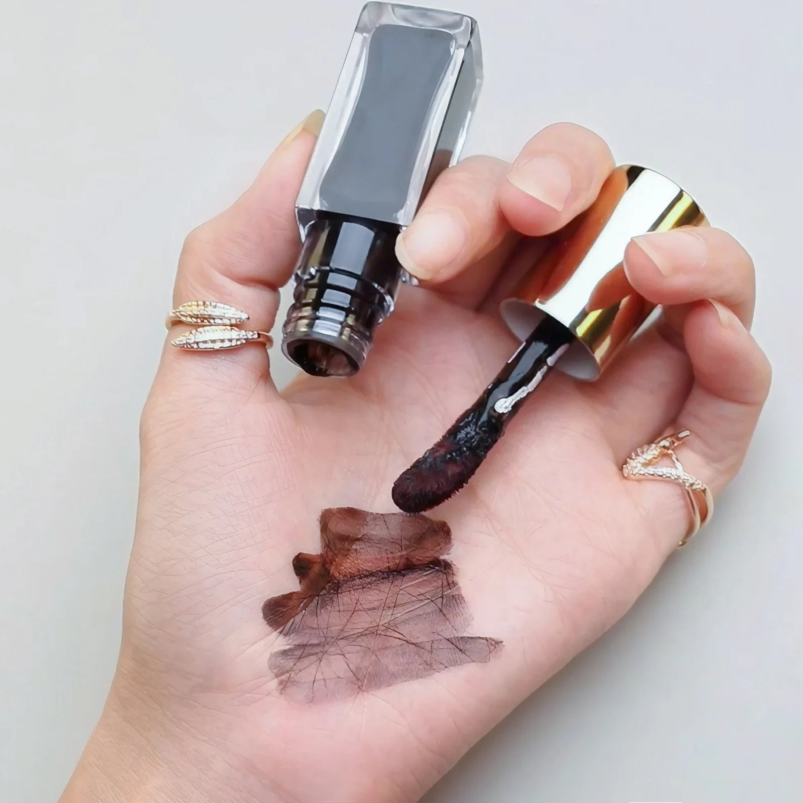 Wholesales 2 Colors Lip Tint High Pigment No Logo Moisturizing Lip Oil Beauty Makeup Black Brown Lipstick Private Label Lip Tint