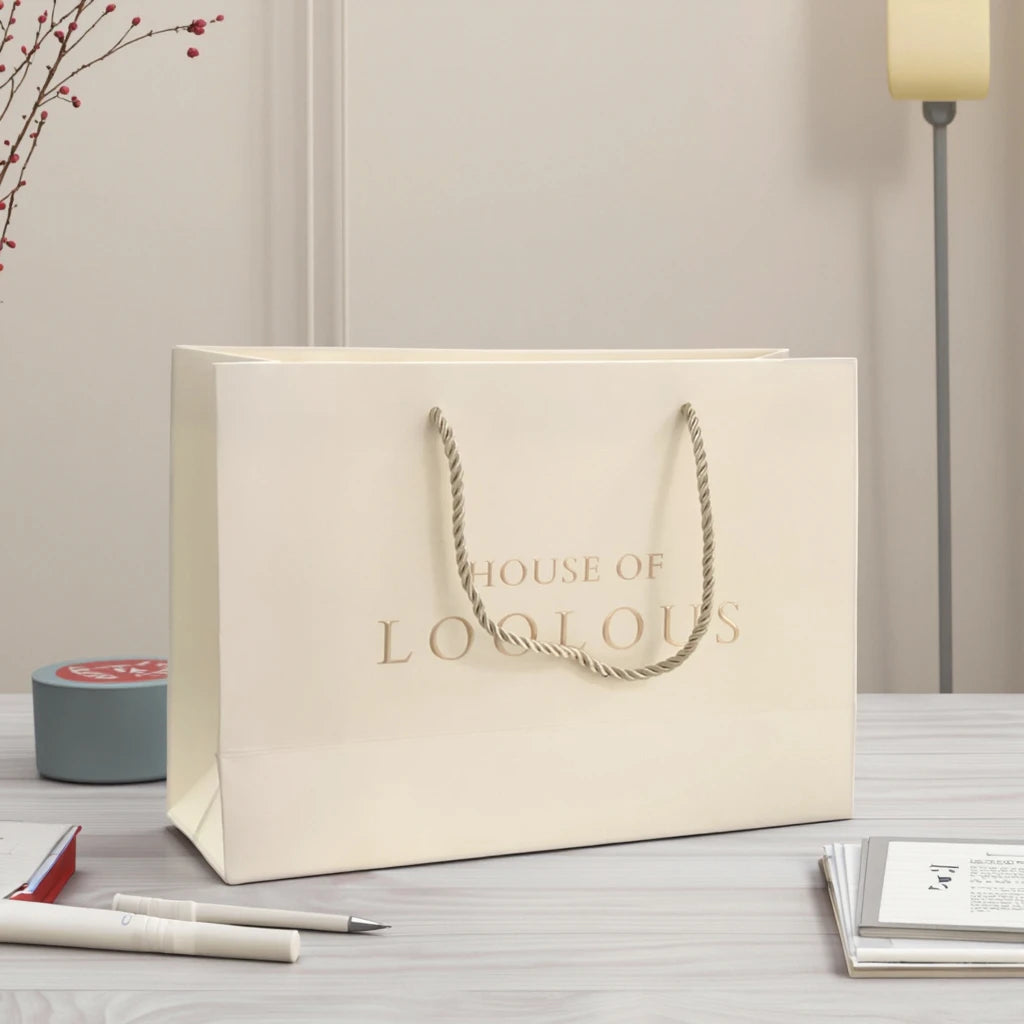 Luxury Ribbon Handle Cardboard Shopping Packaging Bag Customized Embossed Gold Foil Paper Gift Bags With Logo
