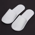 Factory Direct Eco-Friendly Machine Made Disposable Hotel Amenities Comfortable Black and White Non-Woven Sole Slippers