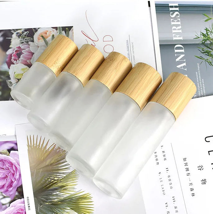 Off the Shelf Bamboo Covered Frosted Glass Lotion Bottle Spray Bottle 30 50 60 80 100 120ml with Laser Engraving and Printing.