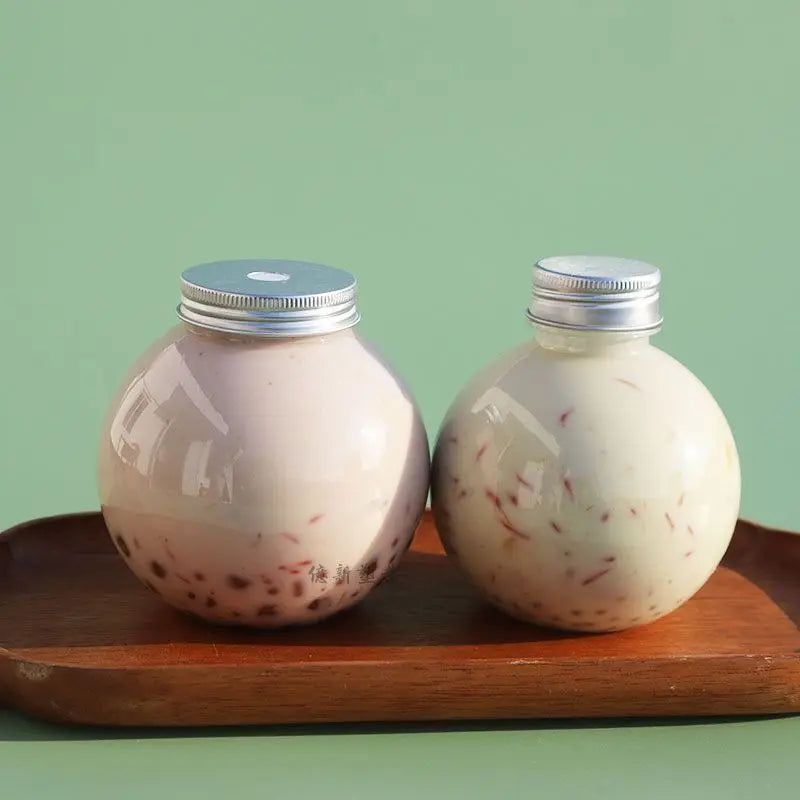500ml Creative Design Round Plastic Bottle Milk Tea Juice Disposable Bottle PET Material 17oz