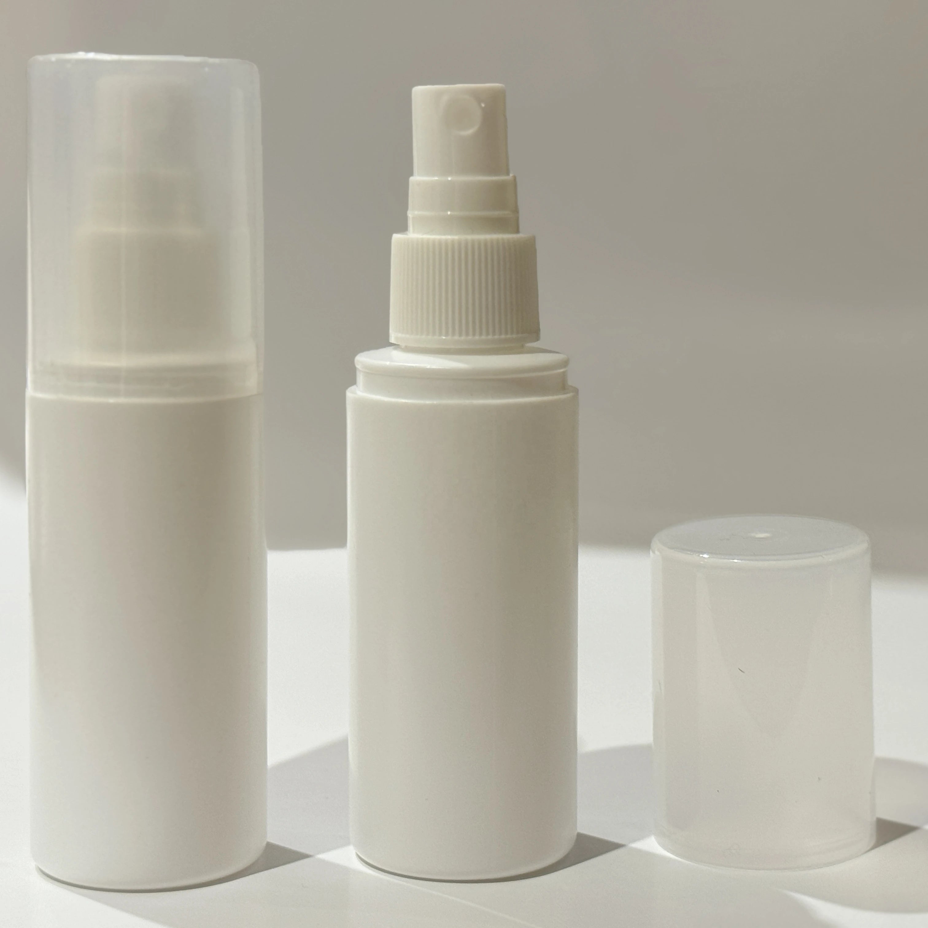 10ml 100ml HDPE Round Lotion Bottles with Roll on Sealing Screen Printing Opaque White for Skin Care Serum