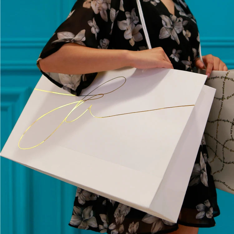 Free Sample Small Quantity Customized Gold Foil Paper Bag Colorful Plain Art Paper Bag With Ribbon Handle