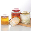 Factory Produced Striped 150ml 200ml 280ml 380ml 500ml Food Grade Empty Clear Round Glass Honey Jar