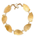 DUYIZHAO Waves of Sculptural Shells Are Hand-hammered in Golden Brass to Form a Statement Collar Necklace