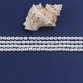 Zhuji Wholesale 3*4mm or 4*5mm Shell of Rice Pearl Natural White Stands for Sale