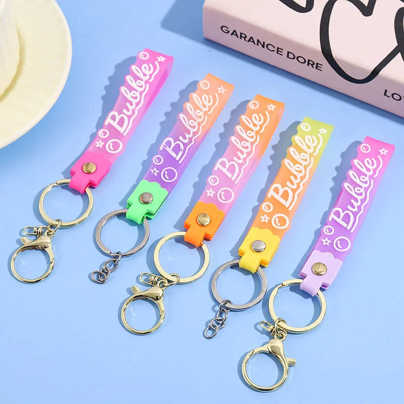 Embossed Custom Logo Cartoon Solid Transparent Keychain Creative Wrist Strap Cute Key Ring Gifts for Women Girls
