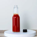 Cheap 150ml 250ml Empty Clear Spice Jar Tomato Sauce Chili Salad Ketchup Hot Sauce Glass Bottle with Black Cap Home Kitchen