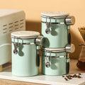 Whole Sale Light Green Glass sealed Jar Coffee Beans Flower Tea Storage Stainless Steel Container