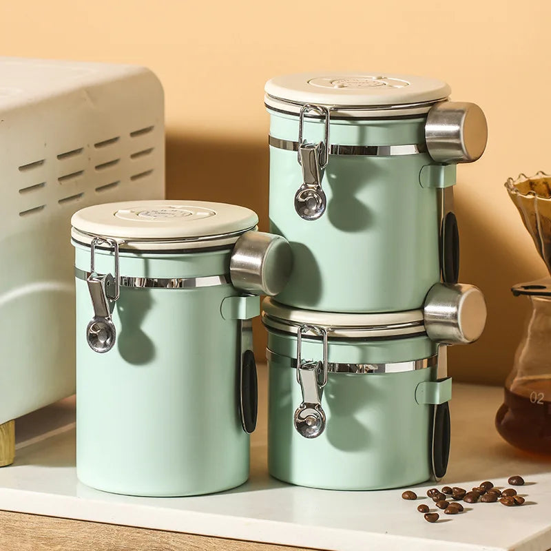Whole Sale Light Green Glass sealed Jar Coffee Beans Flower Tea Storage Stainless Steel Container