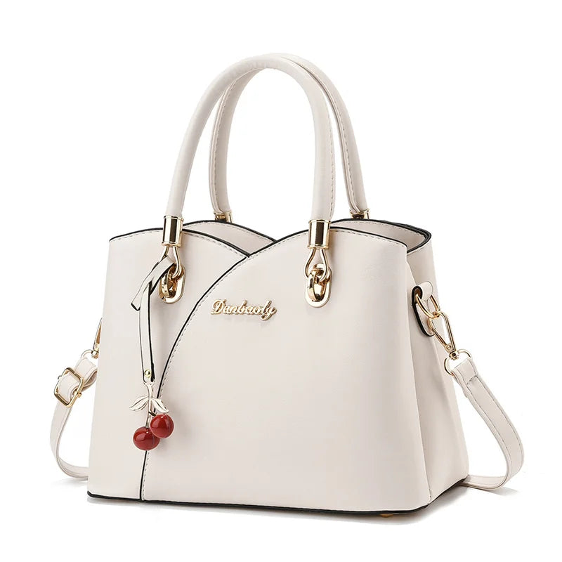 2024 Little Fresh Versatile Soft Leather Shoulder Handbags Ladies New Solid Color Pendant Fashion Zipper Closure Bucket PU