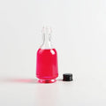 Mini Size 50ml Round Shaped Glass Liquor Bottle With Screw Cap