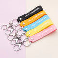PD509 Factory PVC Wristband with UV Printed Key Ring Stylish Plastic Rubber Band Key Chain Bracelet Metal Key Chain