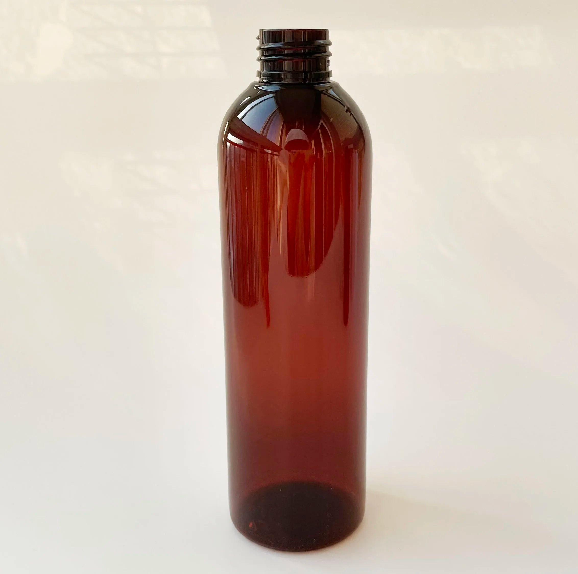 8oz 250ml Amber Plastic PET Cosmo Bullet Shaped Bottle With 24/410 Dispensing Top Cap Lids Cosmetic Skincare Liquid Container