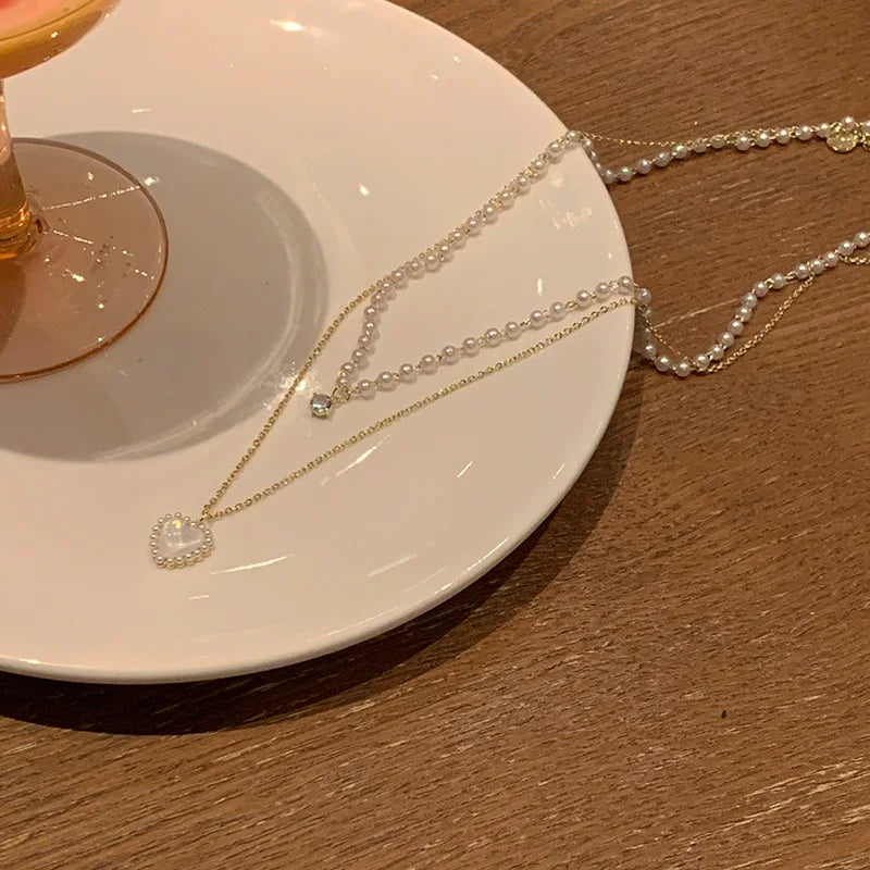 Fashion Pearl Double-layer Stainless Steel Necklace Female Personality Cat's Eye love Pendant Fresh and Sweet Clavicle Chain