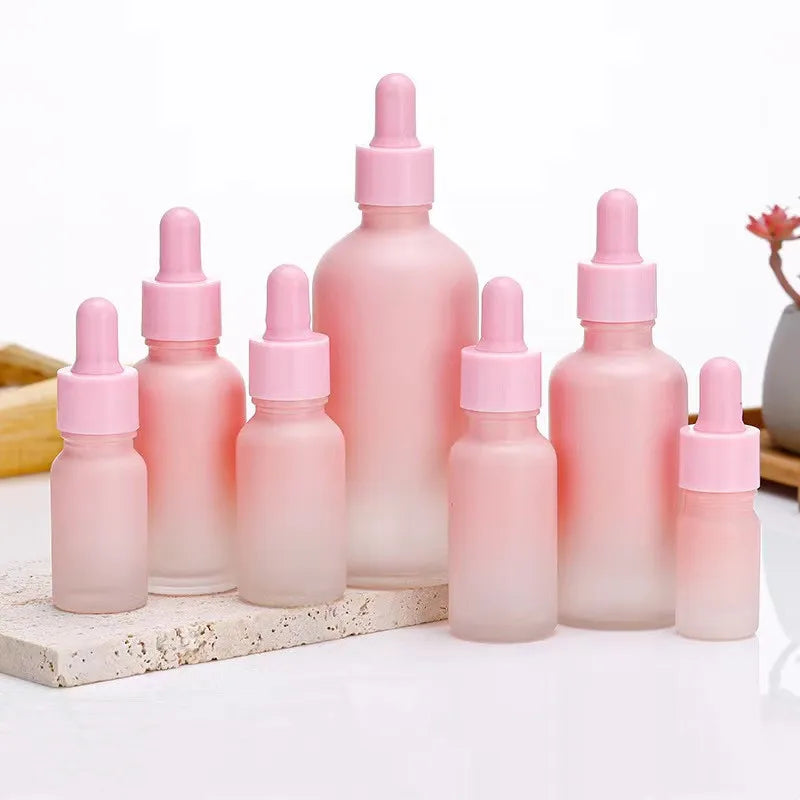 Hot Sale Luxury Matte Pink Glass Dropper Bottles Cylinder Shape 5ml 100ml Empty Liquid Serum Cream Packaging for Essential Oils