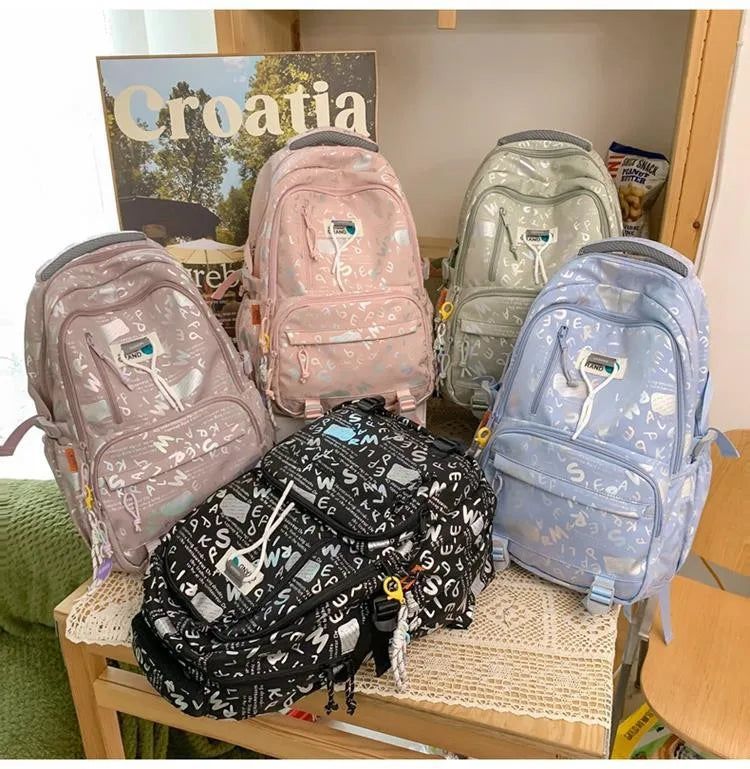 Custom Logo Softback School Backpack Waterproof Nylon Zipper Closure Cell Phone Pocket Cartoon Pattern Design Girls 15 Years