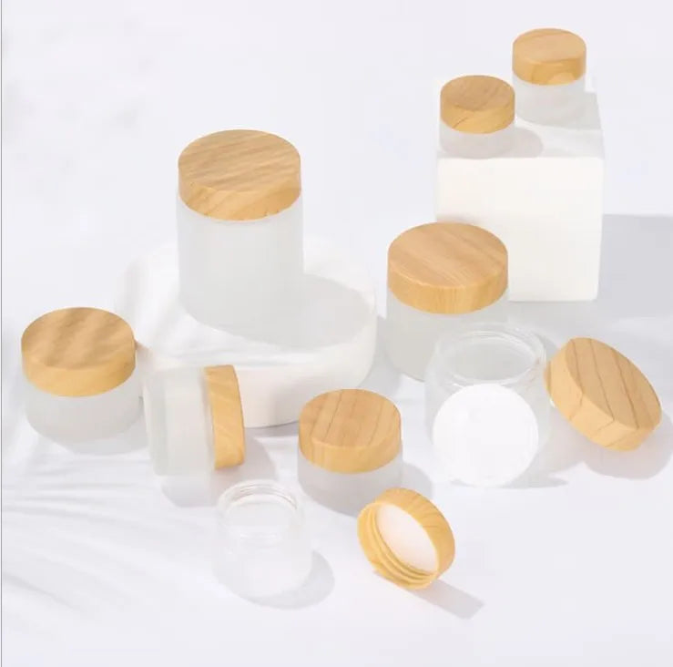 Low Moq Transparent Matte 30G 50G Cylinder Airtight Face Eye Cream Cosmetic Glass Jar with Bamboo Lids