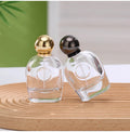 Wholesale New Design Oval Magnetic Ball Cap 80ml Crimp Perfume Glass Sprayer Bottles