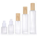 20ml 30ml 1oz 40ml 50ml 60ml 80ml 100ml 120ml Frosted Glass Pump Bottle With Wood Grain Cap for Cosmetic Emulsion Essence
