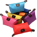 Wholesale Customized Female Waterproof Folding Makeup Bag Dumpling Toiletry Cosmetic Bag With Zipper
