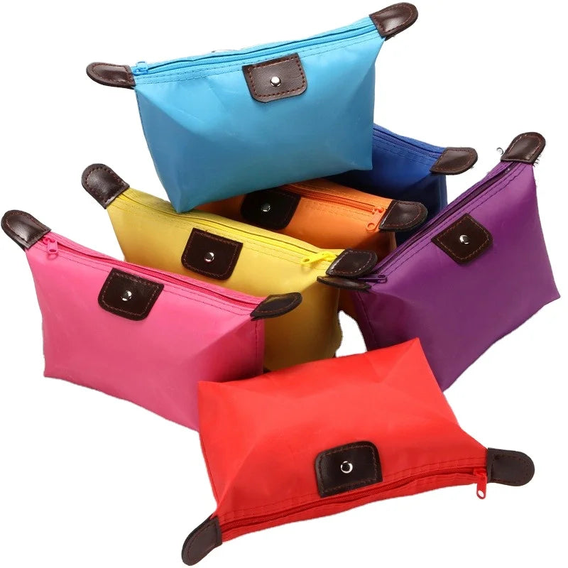 Wholesale Customized Female Waterproof Folding Makeup Bag Dumpling Toiletry Cosmetic Bag With Zipper